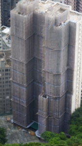 Building clad in bamboo scaffolding 